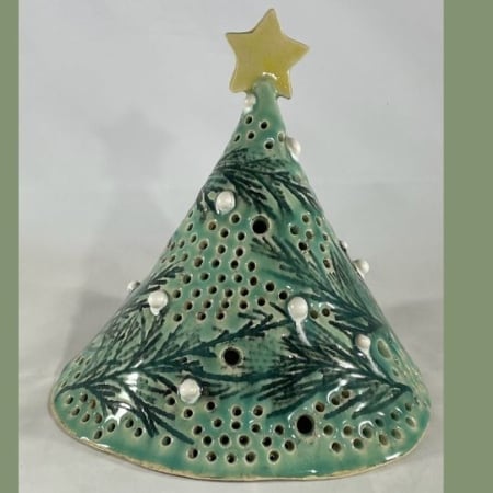 Make a ceramic holiday lumary with clay in this fun pottery workshop